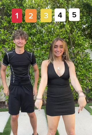 4. Sweetie McKenzi Brooke Shows Cleavage in Black Dress