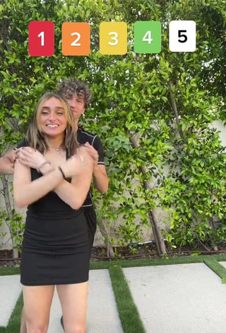 5. Sweetie McKenzi Brooke Shows Cleavage in Black Dress