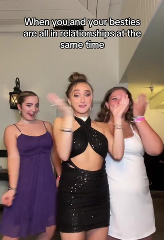 4. Sexy McKenzi Brooke Shows Cleavage in Black Dress