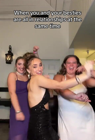 6. Sexy McKenzi Brooke Shows Cleavage in Black Dress