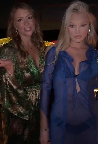 4. Seductive Meredith Duxbury Shows Cleavage in Dress