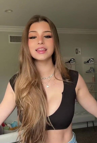 Sensual Brooke Monk Shows Cleavage in Black Crop Top