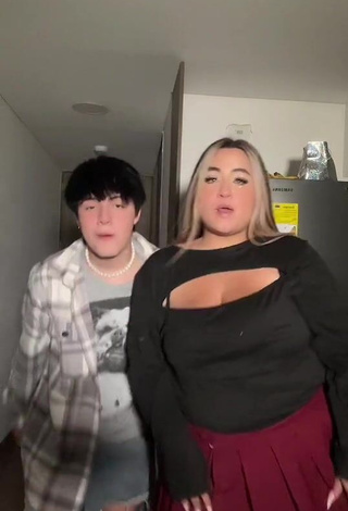 Seductive Maleja Rodriguez Shows Cleavage in Black Top
