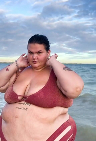 1. Wonderful Thais Carla Shows Cleavage in Red Bikini in the Sea
