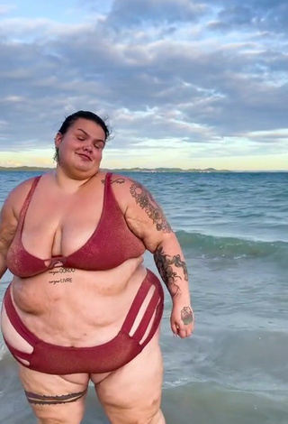 3. Wonderful Thais Carla Shows Cleavage in Red Bikini in the Sea