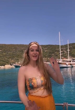 2. Sexy Tessa Bear in Snake Print Bikini Top on a Boat