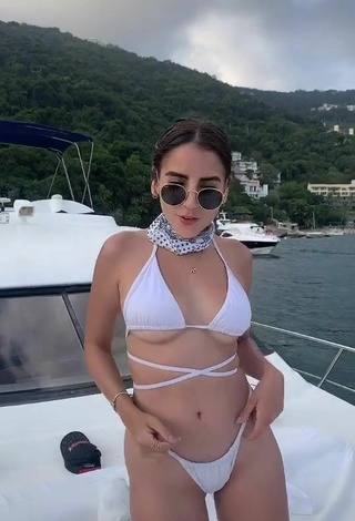 3. Sexy Diana Larume in White Bikini on a Boat