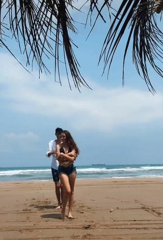 2. Sexy Elaine Haro in Black Bikini Top at the Beach