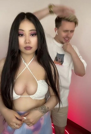 Sexy Ayushieva Erzhena Shows Cleavage in White Hot Top