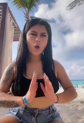 5. Sexy Fernanda Ortega in Black Crop Top at the Beach