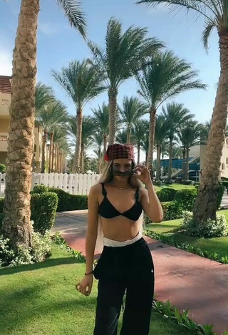 Cute Julia Gavrilina in Black Bikini Top