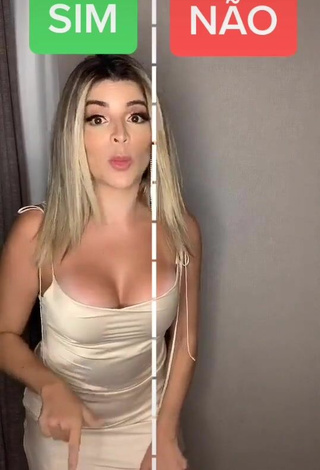 4. Sexy GKAY Shows Cleavage in White Dress