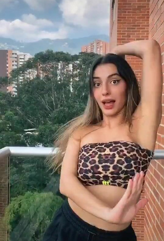 4. Sexy Isabela Delgado Urreta in Leopard Tube Top on the Balcony