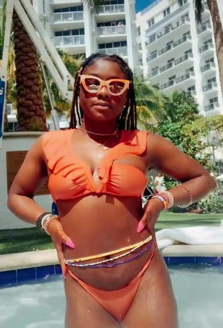Cute Aba Asante in Orange Bikini at the Swimming Pool