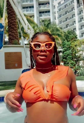 2. Cute Aba Asante in Orange Bikini at the Swimming Pool