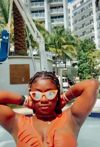 3. Cute Aba Asante in Orange Bikini at the Swimming Pool