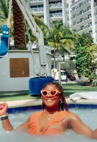 5. Cute Aba Asante in Orange Bikini at the Swimming Pool