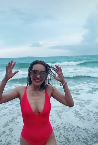 2. Sexy Jelai Andres in Red Swimsuit at the Beach