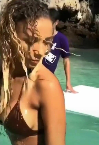 5. Sexy Jena Shows Cleavage in Brown Bikini in the Sea