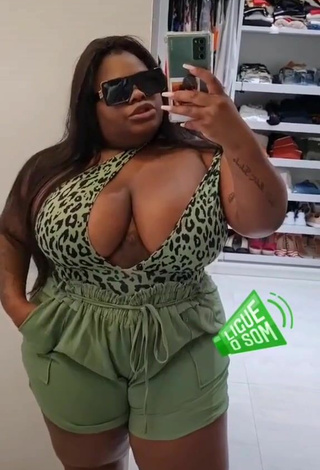 Sexy Jojo Maronttini Shows Cleavage in Leopard Swimsuit