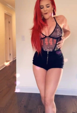 4. Hot Justina Valentine Shows Cleavage in See Through Bodysuit