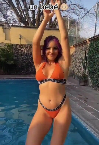 5. Pretty Karla Bustillos Shows Cleavage in Orange Bikini at the Pool