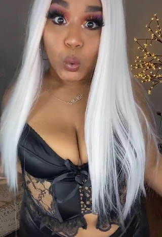 Sexy Carol Acosta Shows Cleavage in Black Corset