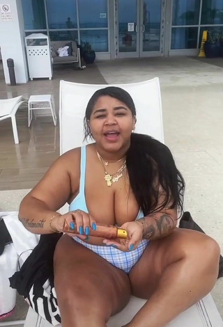 Sexy Carol Acosta Shows Cleavage in Blue Bikini Top