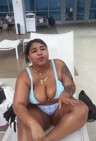5. Sexy Carol Acosta Shows Cleavage in Blue Bikini Top