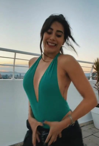 5. Sexy Kim Shantal Shows Cleavage in Green Swimsuit