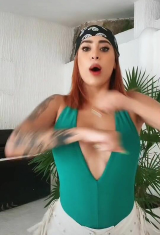 3. Hot Kim Shantal Shows Cleavage in Green Top