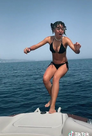 5. Sexy Larissa Kimberlly Shows Cleavage in Black Bikini on a Boat