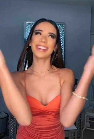 3. Hot Lauren Kettering Shows Cleavage and Bouncing Boobs in Orange Dress