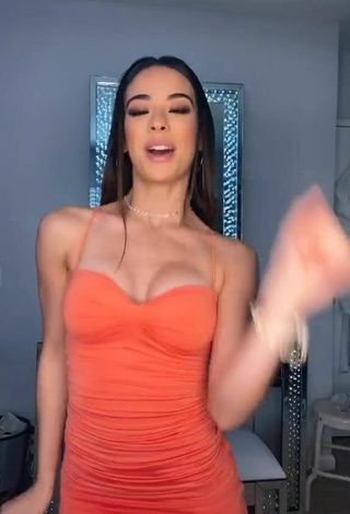 4. Hot Lauren Kettering Shows Cleavage and Bouncing Boobs in Orange Dress