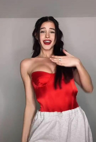 Sexy Lea Elui Ginet Shows Cleavage in Red Top