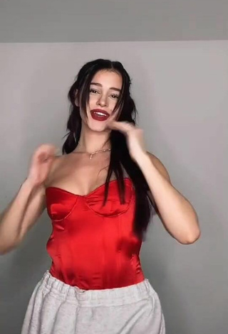2. Sexy Lea Elui Ginet Shows Cleavage in Red Top