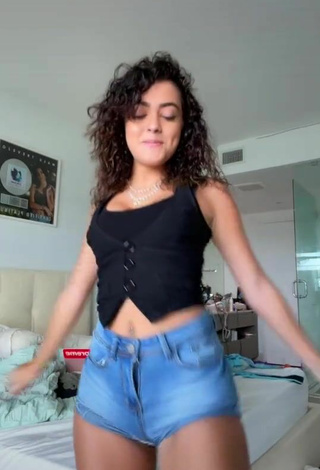 Amazing Malu Trevejo Shows Cleavage in Hot Black Top
