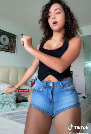 3. Amazing Malu Trevejo Shows Cleavage in Hot Black Top
