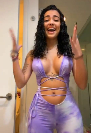 3. Cute Malu Trevejo Shows Cleavage in Purple Overall