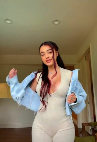 1. Hot Malu Trevejo Shows Cleavage in Grey Overall Braless