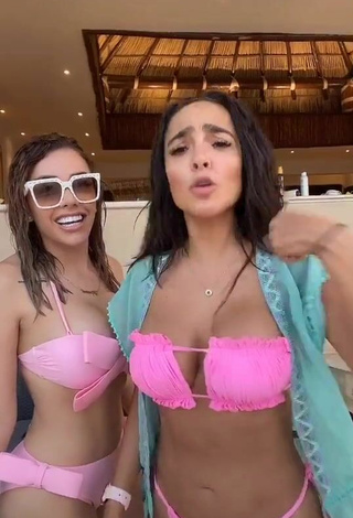 Pretty Manelyk González Shows Cleavage in Pink Bikini