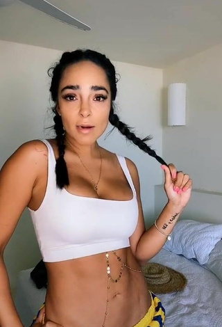 Cute Manelyk González Shows Cleavage in White Crop Top