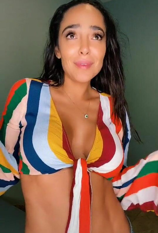 3. Hot Manelyk González Shows Cleavage in Striped Crop Top