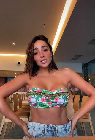 Sexy Manelyk González Shows Cleavage in Bikini Top