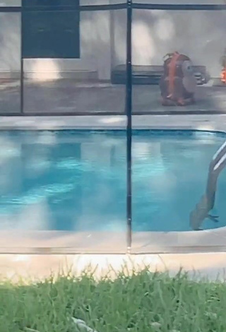 2. Elegant Megan Guthrie in Leopard Bikini at the Swimming Pool