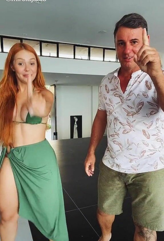 3. Seductive Mirela Janis Shows Cleavage in Green Bikini Top