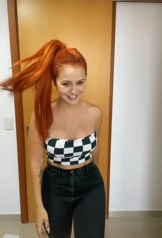 2. Sexy Mirela Janis Shows Cleavage in Checkered Tube Top