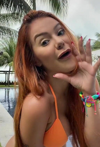 2. Sexy Mirela Janis in Orange Bikini at the Pool