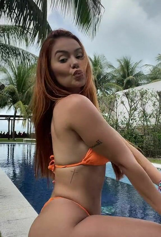 5. Sexy Mirela Janis in Orange Bikini at the Pool