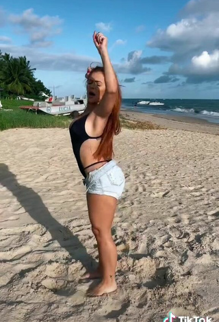 3. Sexy Mirela Janis in Black Swimsuit at the Beach while Twerking